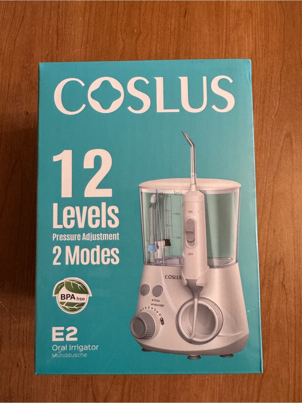 COSLUS E2 Oral Irrigator - Teal Packaging